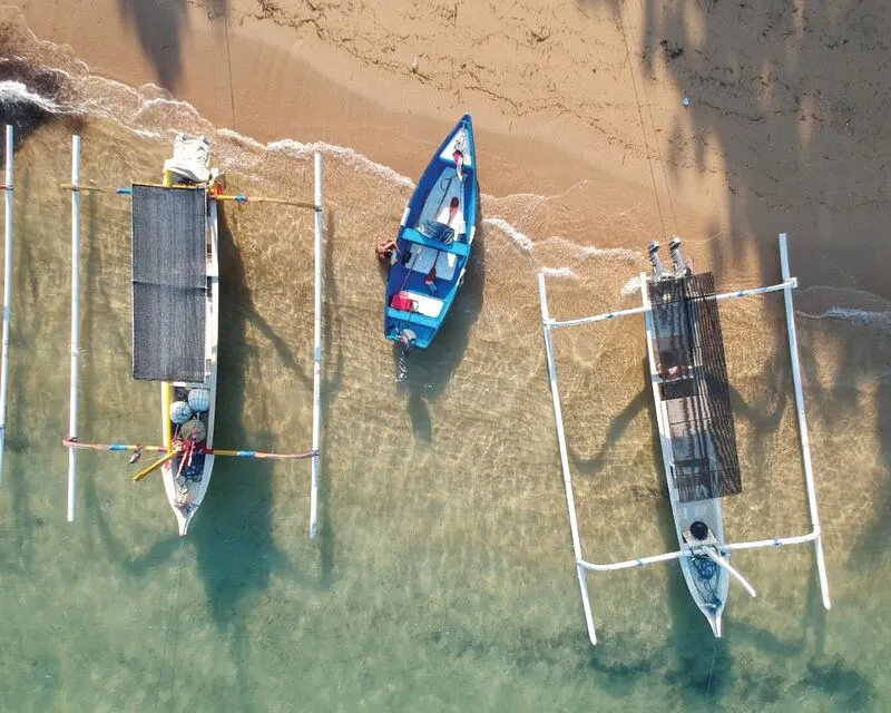 Traditional jukung boats on Sanur beach in front of Lilla Pantai