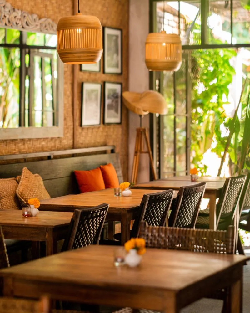 The warm wooden dining room at Lilla Warung