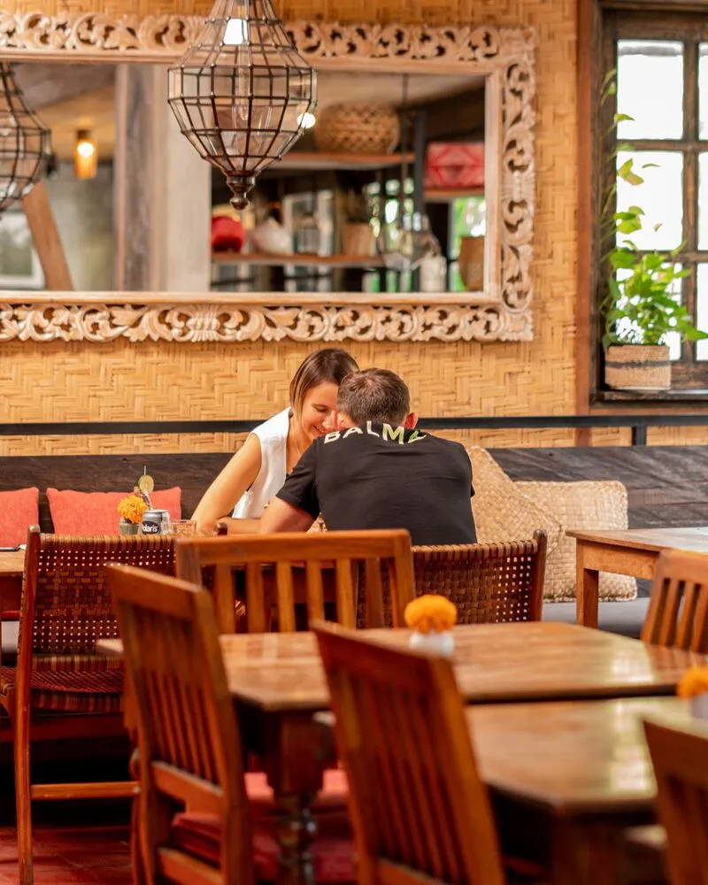 A couple sharing a meal at Lilla Warung